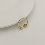 Tory Burch rhinestone round logo ring, gold-tone open band with logo face detail