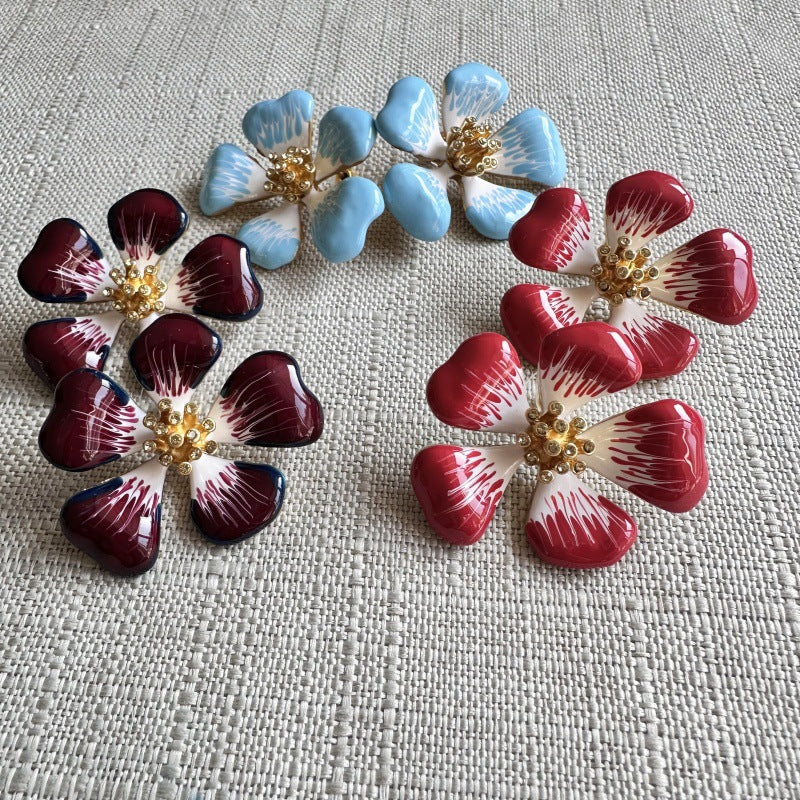 Cherry blossom enamel stud earrings, dark purple gradient petals with gold center
