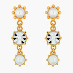 Round crystal drop earrings with white-toned top and center stones and clear bottom circles
