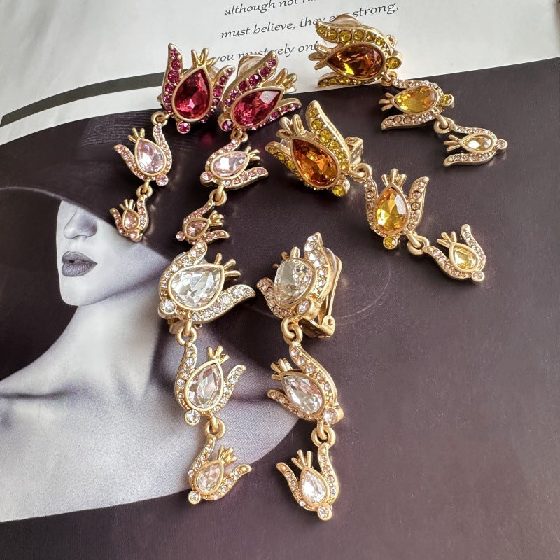 Gold-tone floral zircon drop earrings with pink and clear teardrop stones