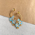 Long enamel flower hoop drop stud earrings with blue petals and gold accents
