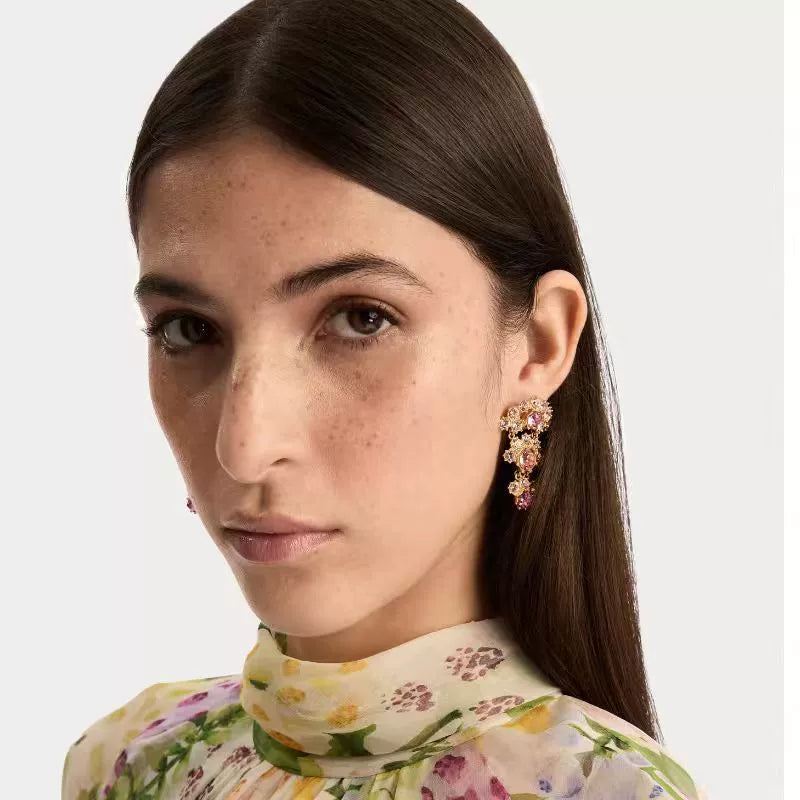 Rose pink crystal arched fan earrings with dangling teardrop drops, gold-tone