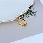 Enamel geometric circle ring with black enamel inlay on the gold-tone band