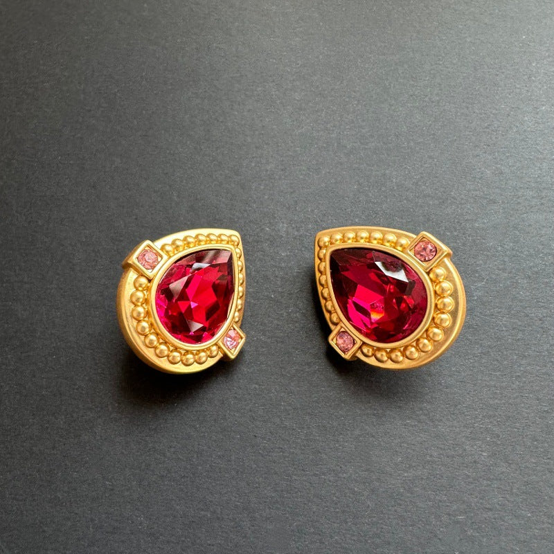 Red crystal heart stud clip-on earrings with gold frame and pink accents