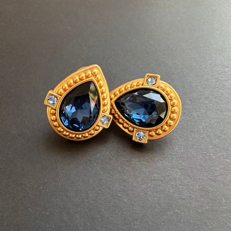 Dark blue crystal heart stud clip-on earrings with gold setting and clear corner stones