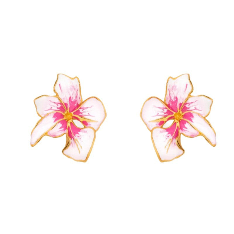 Pair of multicolor flower-shaped enamel earrings with magenta center and white petals
