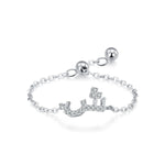 Sterling silver adjustable chain bracelet with Arabic letter charm in clear stones, arch design