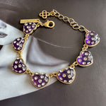 Purple matte heart bracelet, gold-tone chain with heart charms