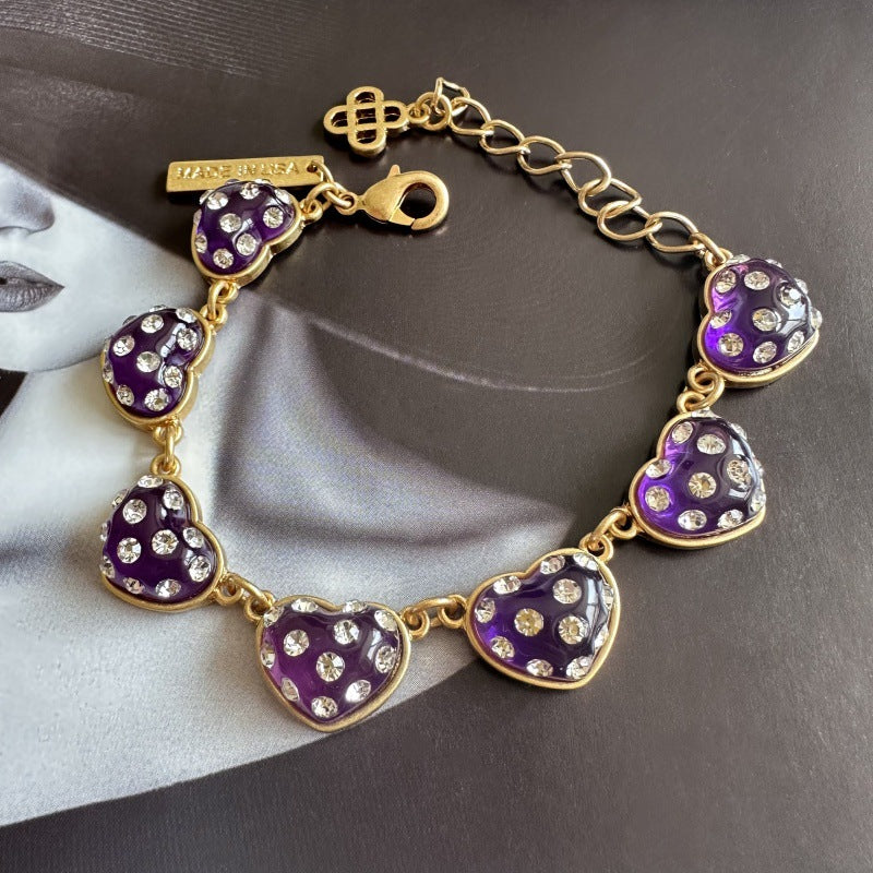 Purple matte heart bracelet, gold-tone chain with heart charms