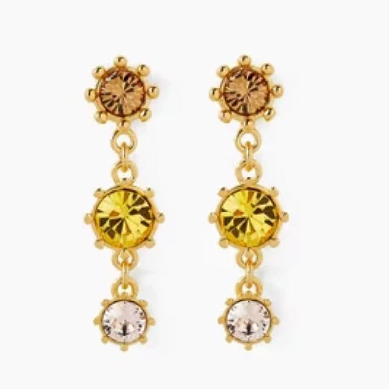 Round crystal drop earrings with amber top, yellow middle, and clear bottom stones