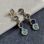 Full-crystal square drop earrings with blue and teal stones in gold-tone frames