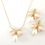 Bow pendant necklace with pink enamel and white pearl drop, plus matching earrings