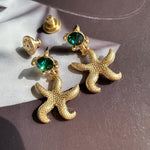 Oscar de la Renta vintage gold starfish stud earrings with green crystals
