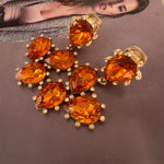Cactus-cut sparkling glass diamond ear clips in orange with gold-tone settings