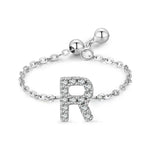 Adjustable sterling silver bracelet with pavé R-shaped initial charm and chain links