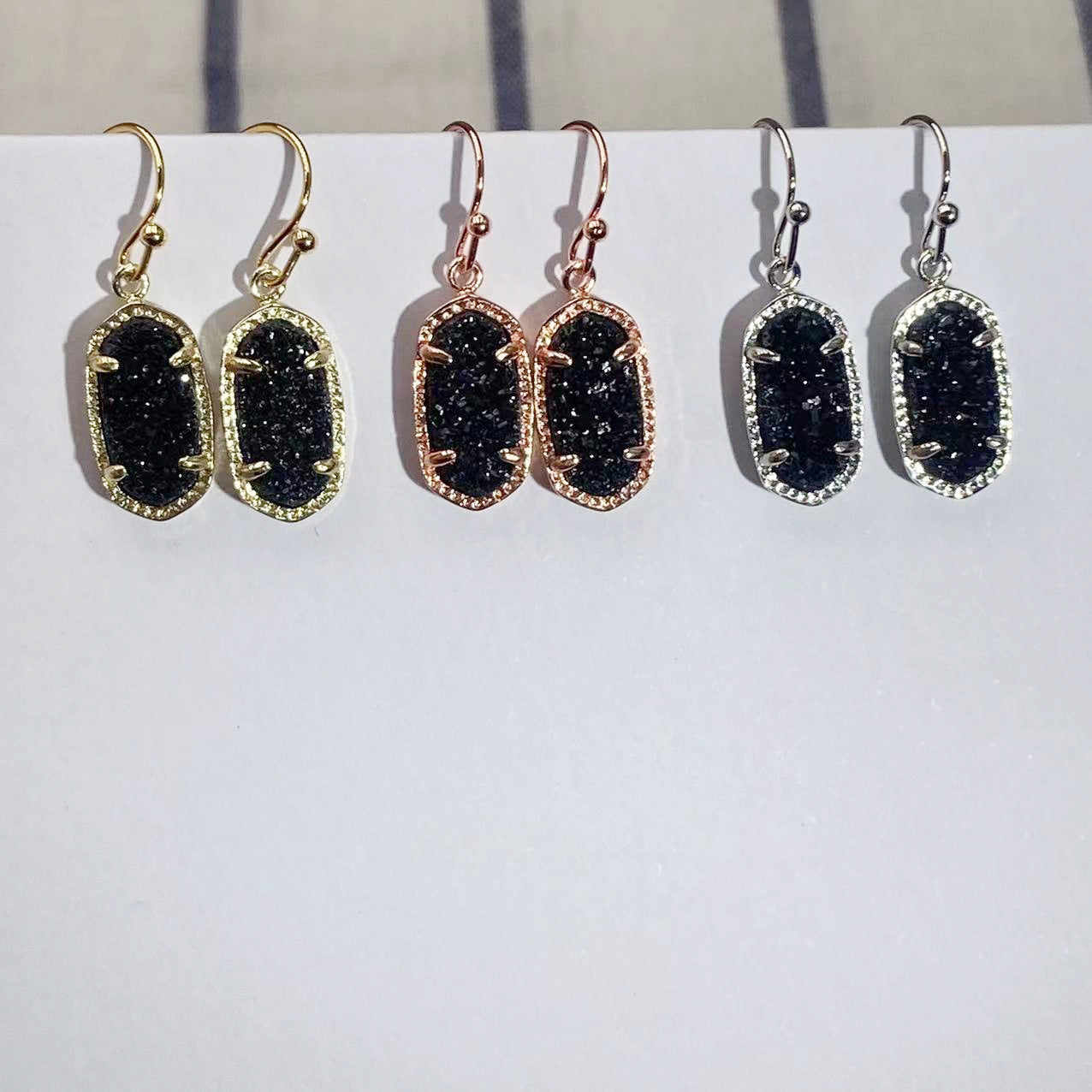 Kendra Scott oval natural black crystal ear hooks