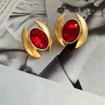 Oval Sparkling Crystal Earrings: ruby red oval crystals in gold crescent frames