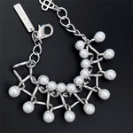 Silver pearl intertwined-link necklace with lobster clasp and dangling charm tags