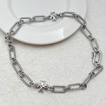Silver square-logo chain bracelet/necklace with chunky links and square charms