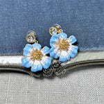 Vintage enamel cherry blossom earrings in light blue and white with round crystal tops