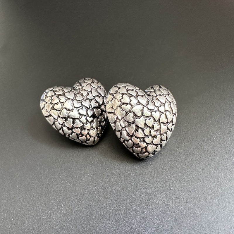Vintage-print heart stud earrings, vintage silver textured heart fronts