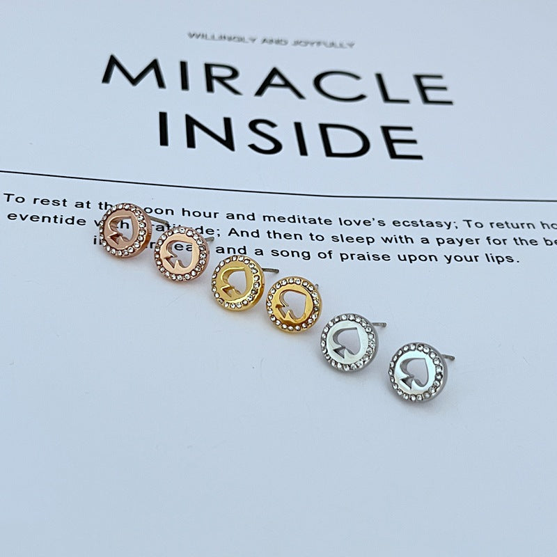 Kate Spade diamond-encrusted openwork heart earrings