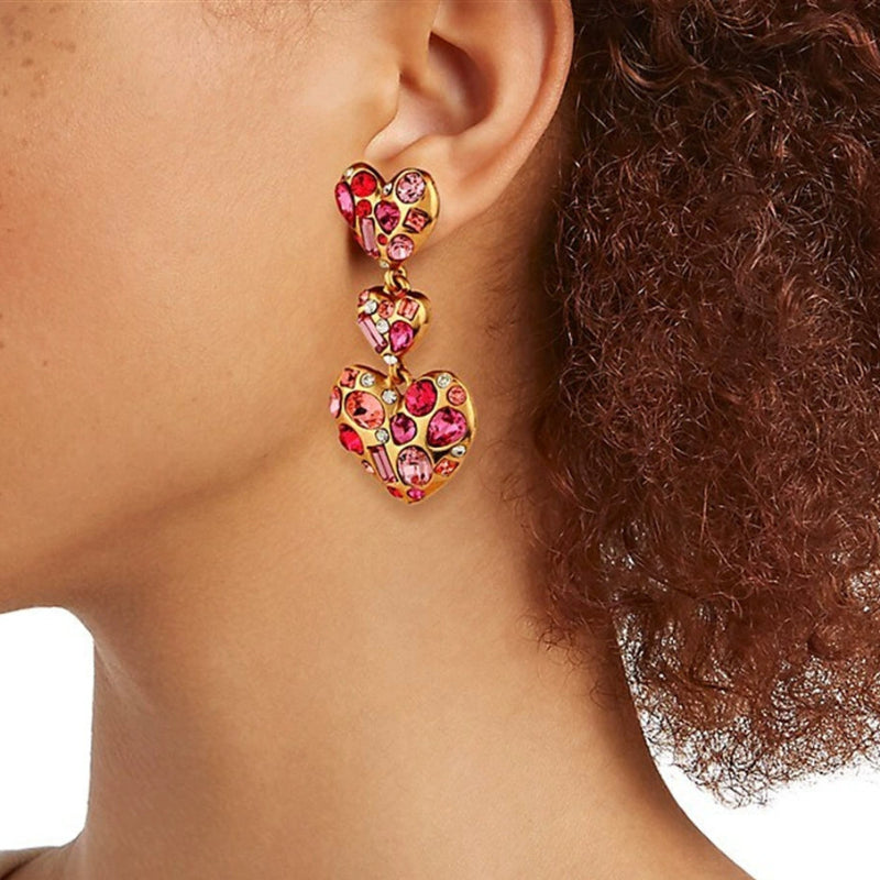 Multicolor crystal heart drop earrings in pink tones on gold-tone hooks