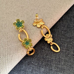 Green crystal floral drop earrings with gold double hoop and oval ring dangles