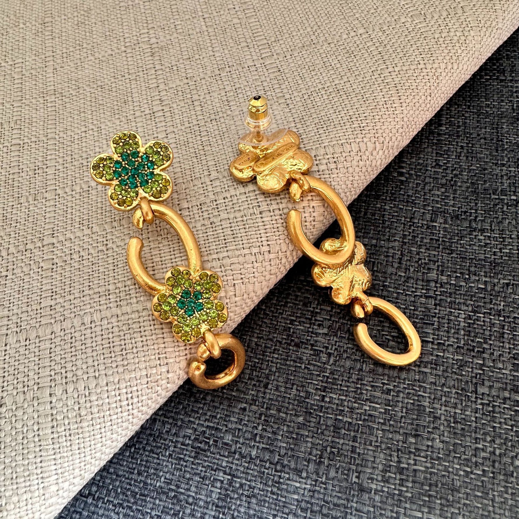 Green crystal floral drop earrings with gold double hoop and oval ring dangles