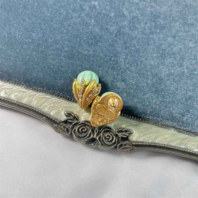 Mint green ice-cream stud earring with gold-tone back post and ornate filigree