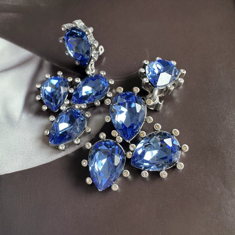 Cactus-cut sparkling glass diamond ear clips in royal blue with silver-tone settings