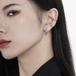 Abstract Textured Hoops with Blue Accents

