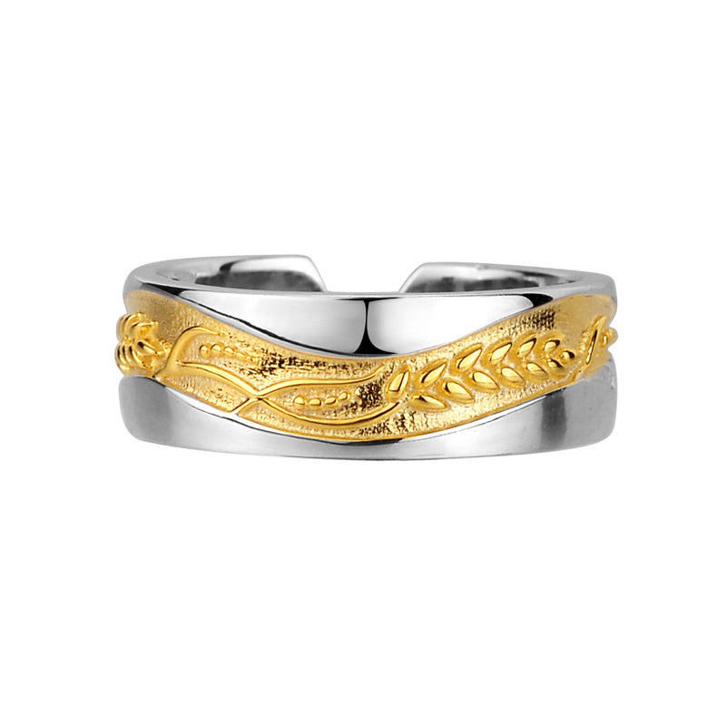 Two-tone wheat ear open ring with overlapping silver and gold bands, shiny finish