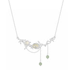 Textured Silver Necklace with Oval and Round Gems

