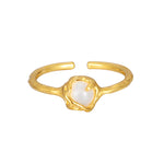 Minimalist Golden Ring with Opalescent Gem

