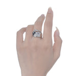 Asymmetric Silver Ring with a White Gemstone

