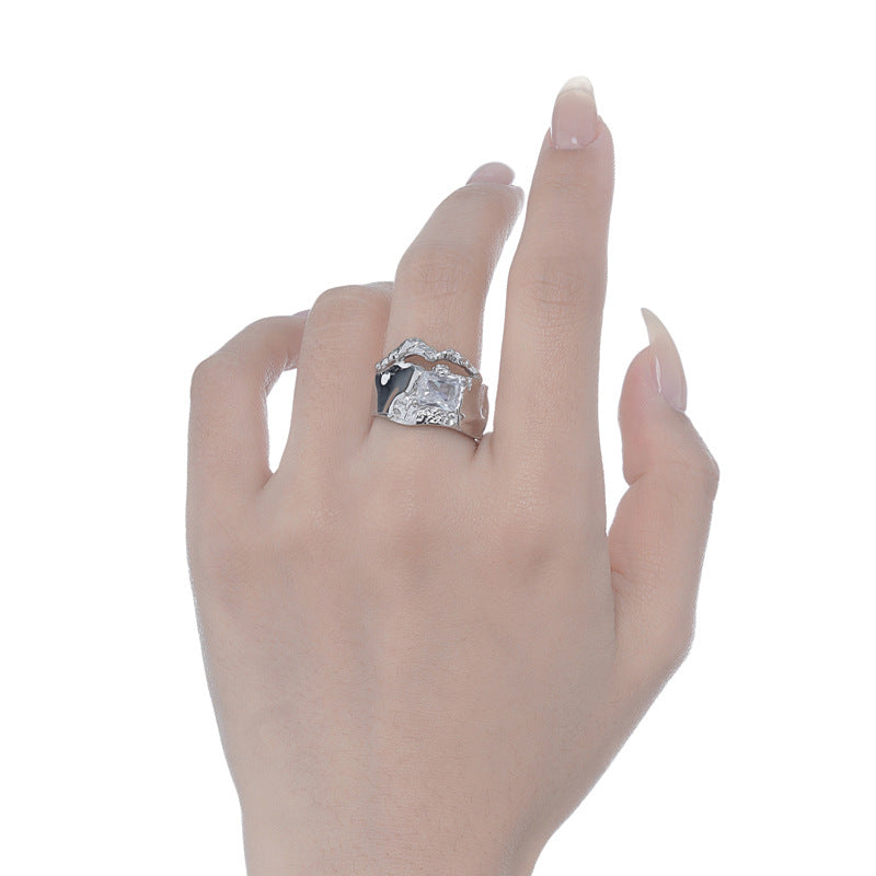 Asymmetric Silver Ring with a White Gemstone


