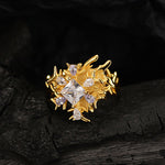 Exquisite Gold and Zirconia Ring on a Hand

