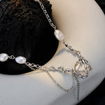 Rustic yet Elegant Pearl Necklace with a Draped Chain

