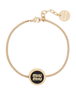 Gold-tone enamel logo round adjustable bracelet with black center disc and chain