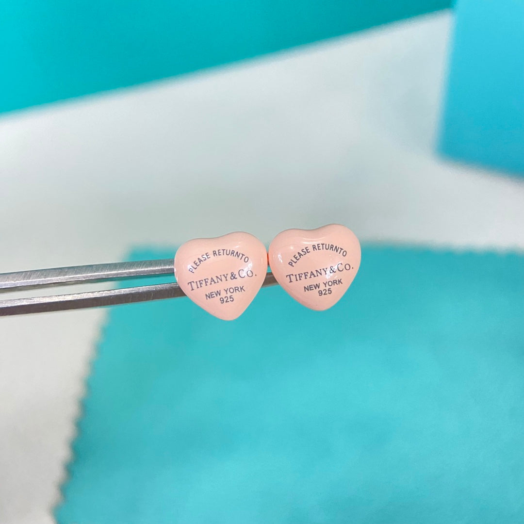 Pink enamel heart stud earrings with post-back clasps