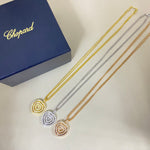 Triple heart pendant necklace with diamond pavé hearts on gold, silver, and rose gold chains