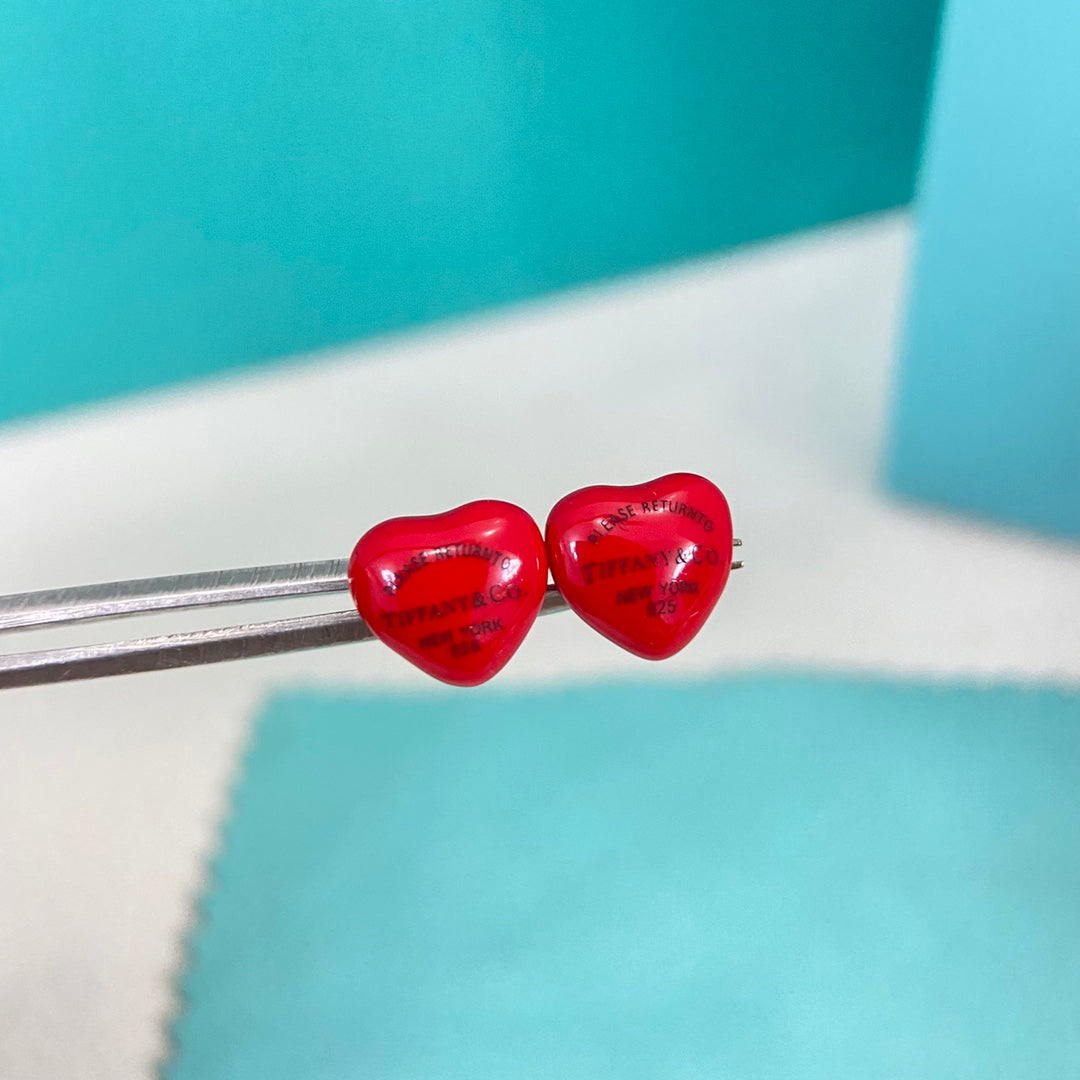 Red enamel heart stud earrings with post-back clasps