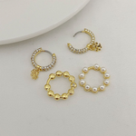 Set of hoop pendant earrings with gold-tone rhinestone hoops and white pearl hoops