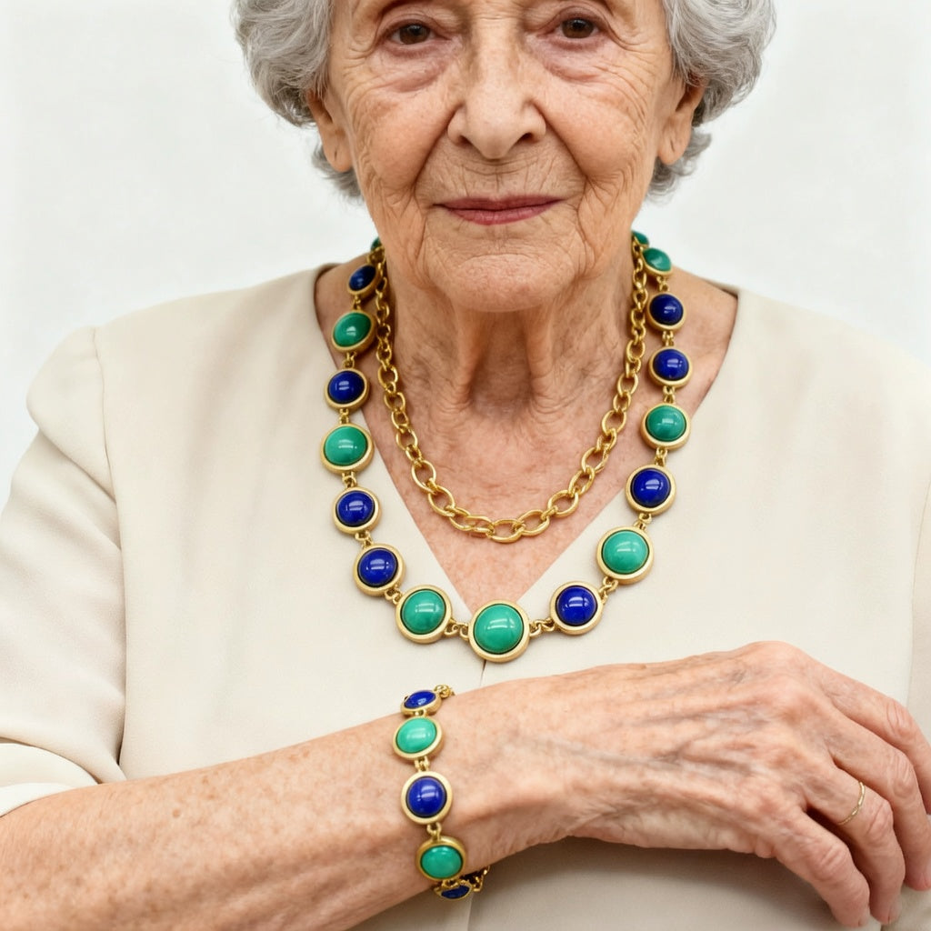 Gold-tone stone necklace and bracelet with turquoise and dark blue round beads worn