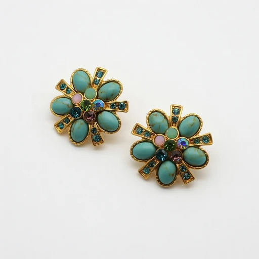 Pair of gold-tone flower stud earrings with turquoise and purple gemstone inlays
