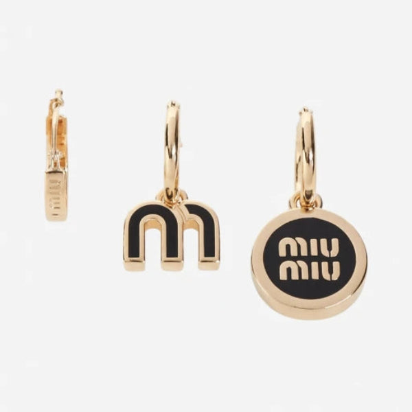 Three-piece enamel logo earrings set in gold tone with black details