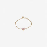 Gold-tone adjustable bracelet with pink enamel heart charm and Miu Miu logo oval