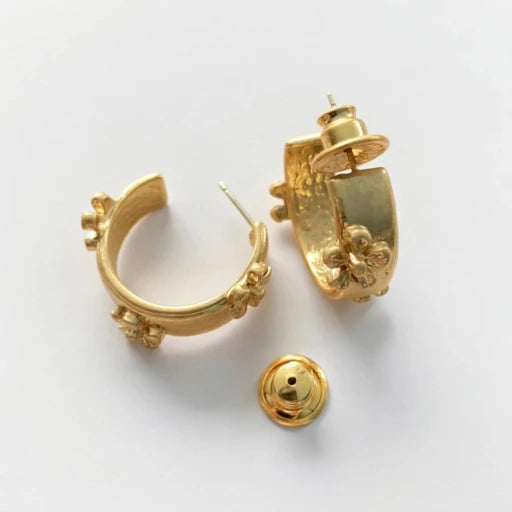Gold-tone C hoop earrings showing hinge and back stud posts