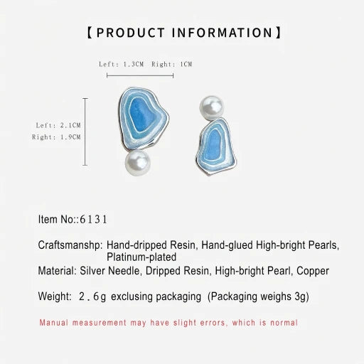 Asymmetric blue enamel drop earrings with white pearls, size diagram on plain background